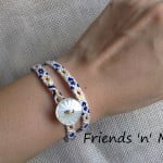 Friendship Bracelet - Double wrap in blue and yellow flower with a pearl like plastic button